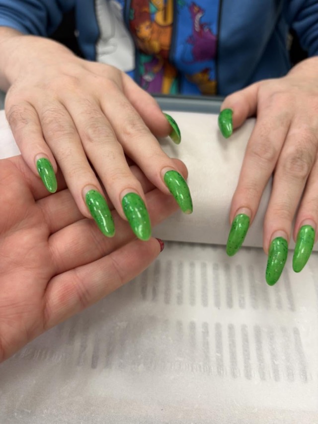Before: natural nails in a bright green polish
